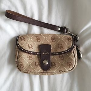 100% Authentic USED Dooney & Bourke Brown Tan Monogram Logo Leather Wristlet